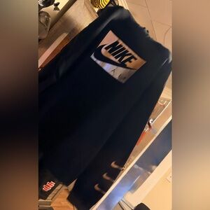 Nike Black Outerwear with Metallic Logo